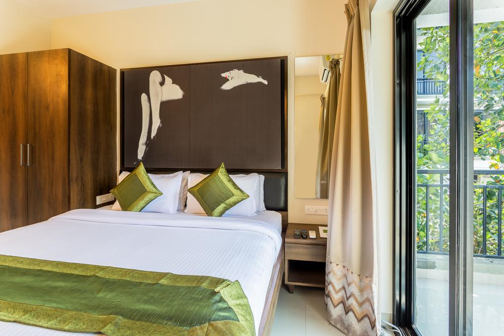 Treebo Trend Zeebo Suites Arpora Exterior foto